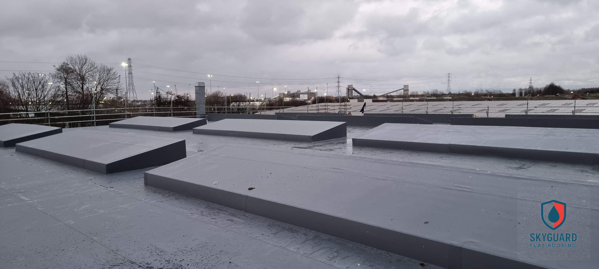 Sky Guard performing electronic leak detection on a commercial flat roof