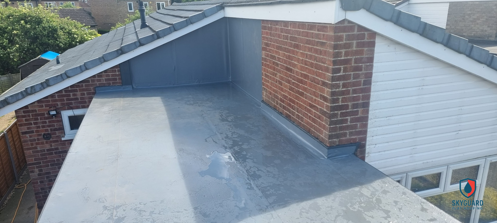 Garage roof in single ply membrane, finished by Sky Guard